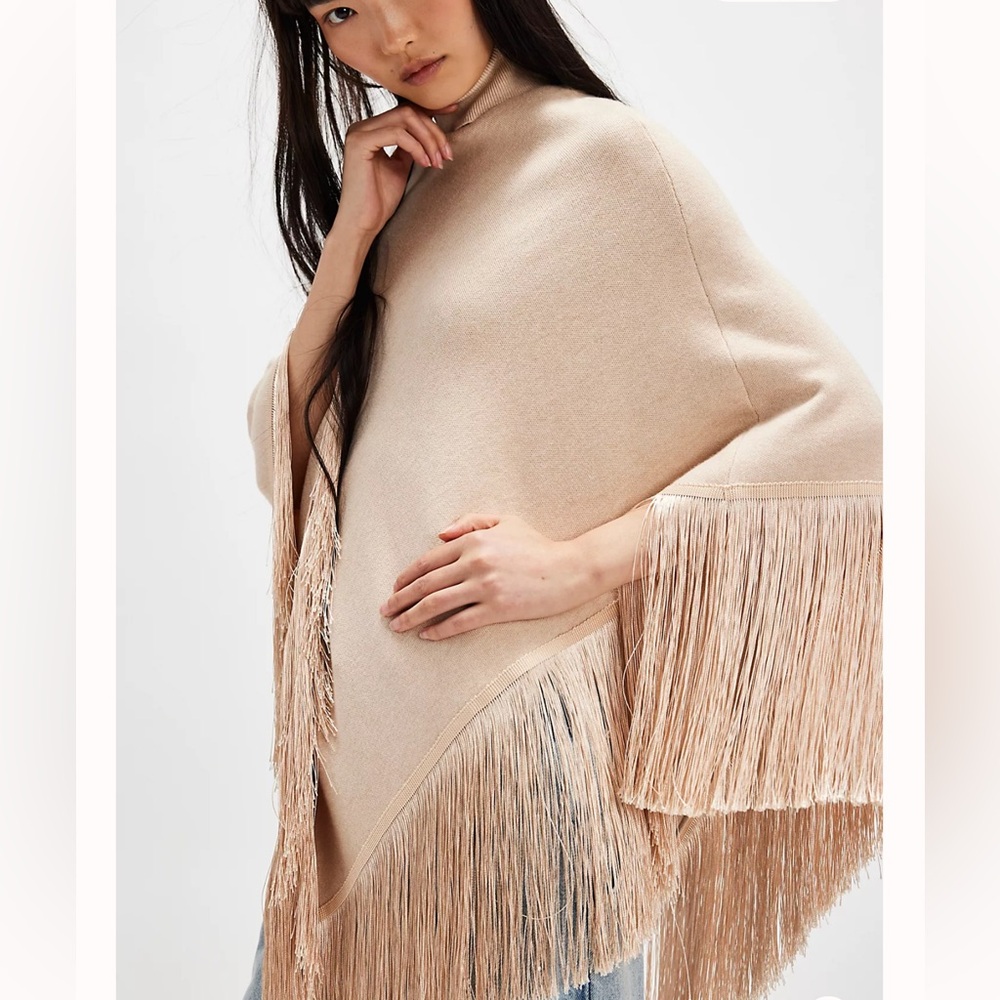 Free People “Understated Leather” Riverwalk Poncho